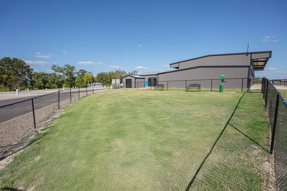 fenced in dog park at Twin Lakes Resort