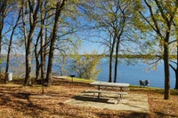 picnic tables next to lake at Lake Bob Sandlin State Park
